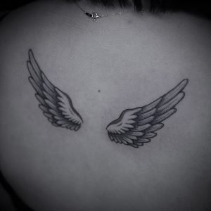 Wing Tattoo on Back